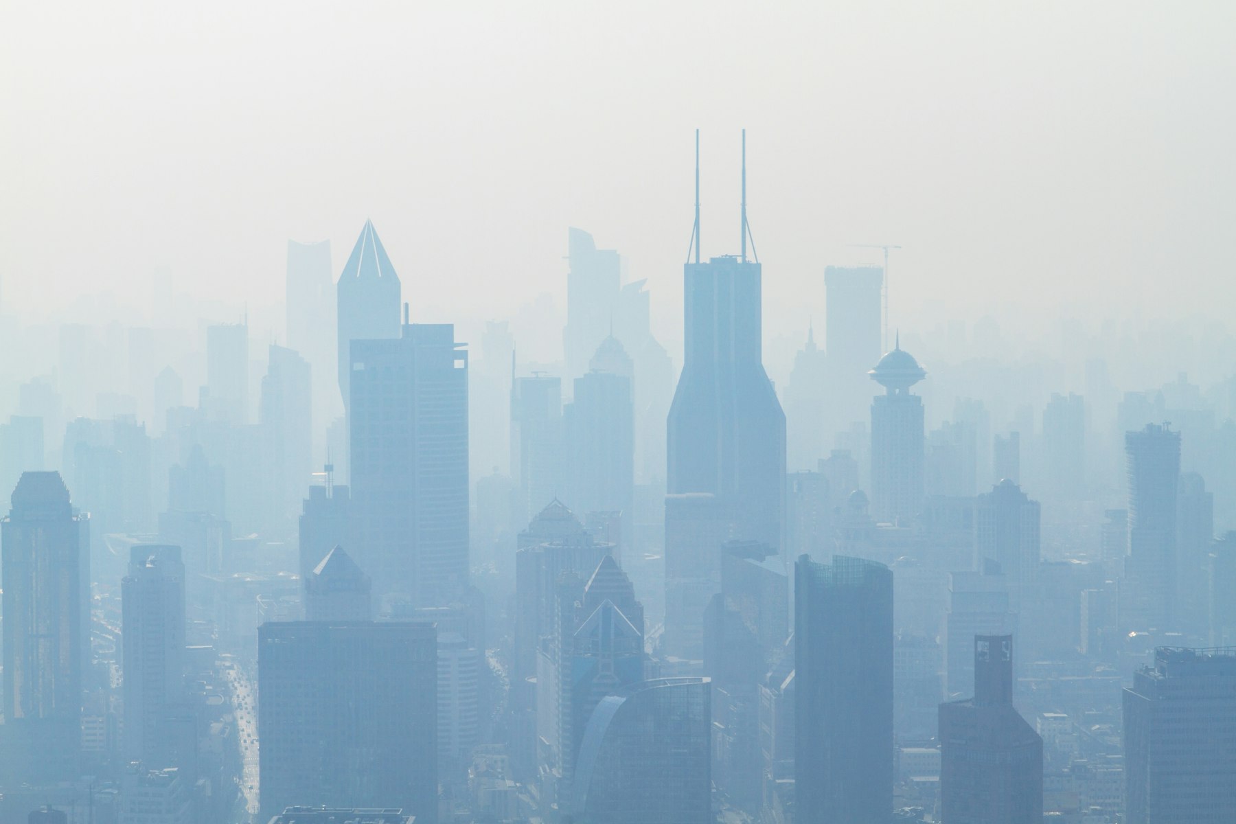 A hazy city skyline showing how pollution can vary across a local area