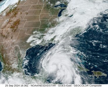 Satellite image of a hurricane near the southeastern United States before land interaction begins to weaken its circulation.