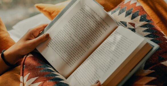 An open book with notes, representing how readers compare book difficulty, interest, and reading purpose.