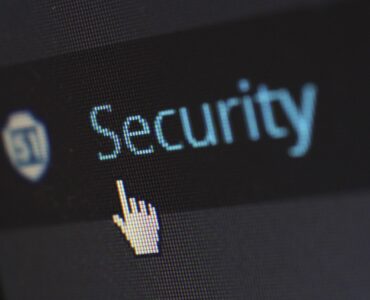 A small lock on a keyboard representing stronger passwords and safer account sign-ins.