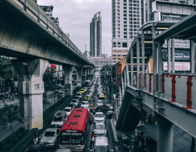 Crowded highway lanes with cars moving slowly in heavy traffic