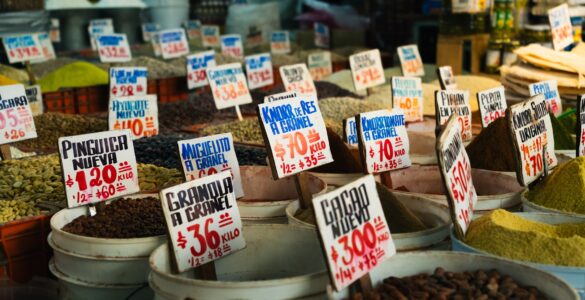 Market price tags showing how posted prices guide buyer and seller decisions.