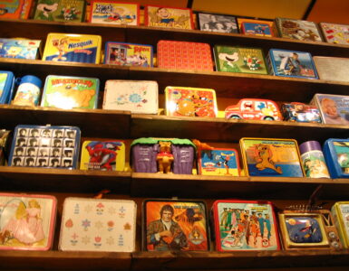 Colorful packed lunch boxes arranged for a school day.