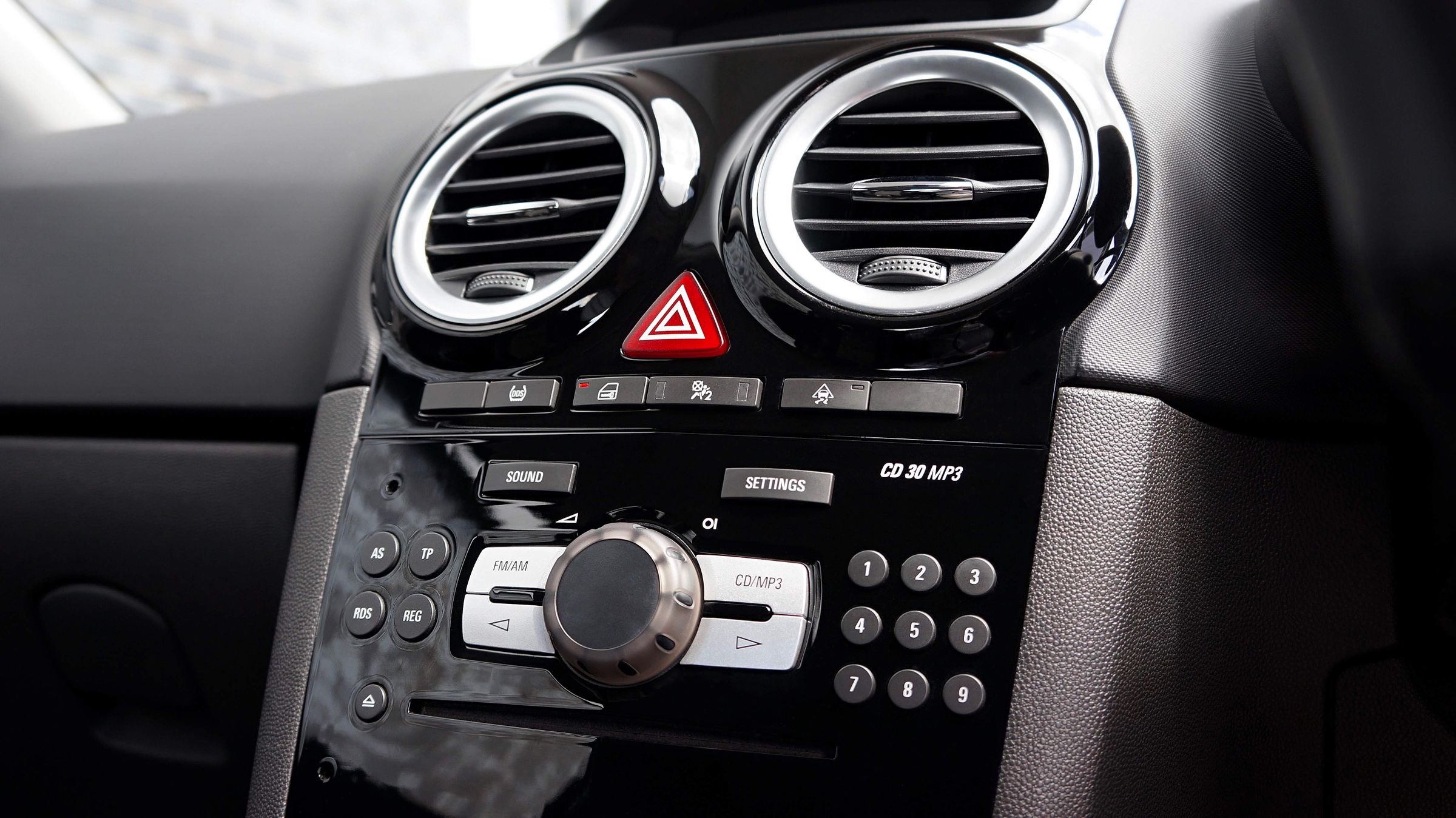 Air vents and climate controls on a car dashboard