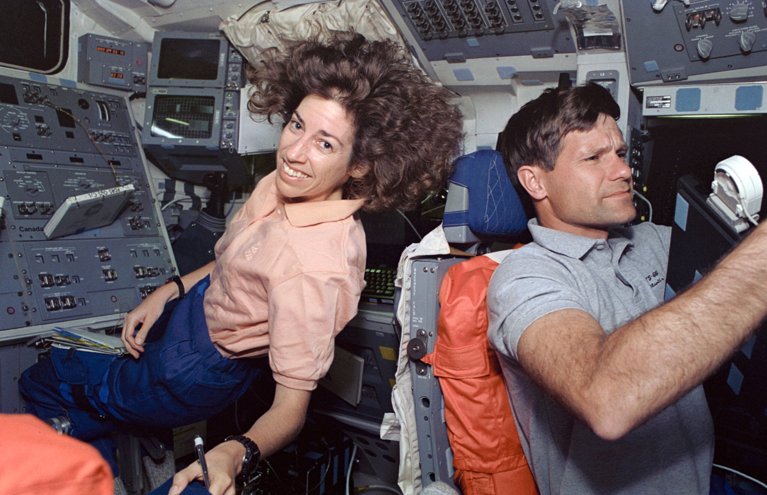 Ellen Ochoa works on the flight deck of Space Shuttle Atlantis during STS-66.