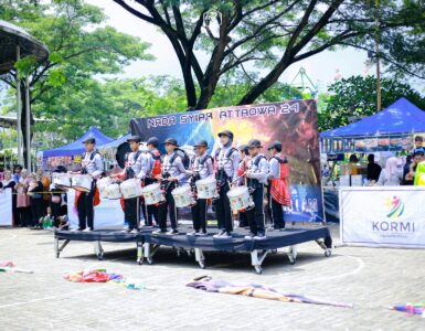 A marching band performs together outdoors in coordinated formation.