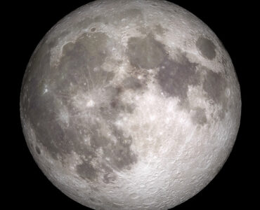 A detailed full Moon with bright highlands, dark maria, and visible cratered terrain.