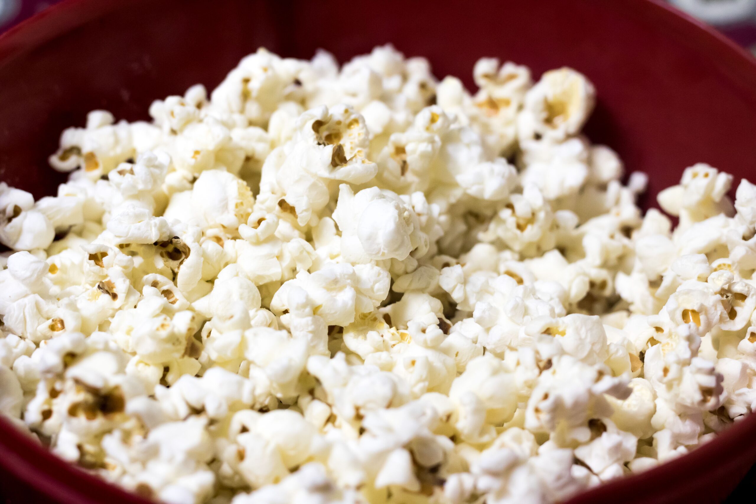 Popped popcorn showing irregular white starch flakes