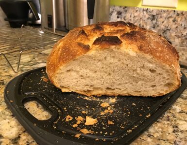 Sliced loaf of sourdough bread showing its soft crumb