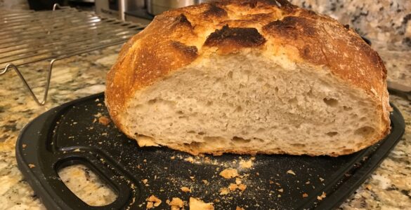 Sliced loaf of sourdough bread showing its soft crumb
