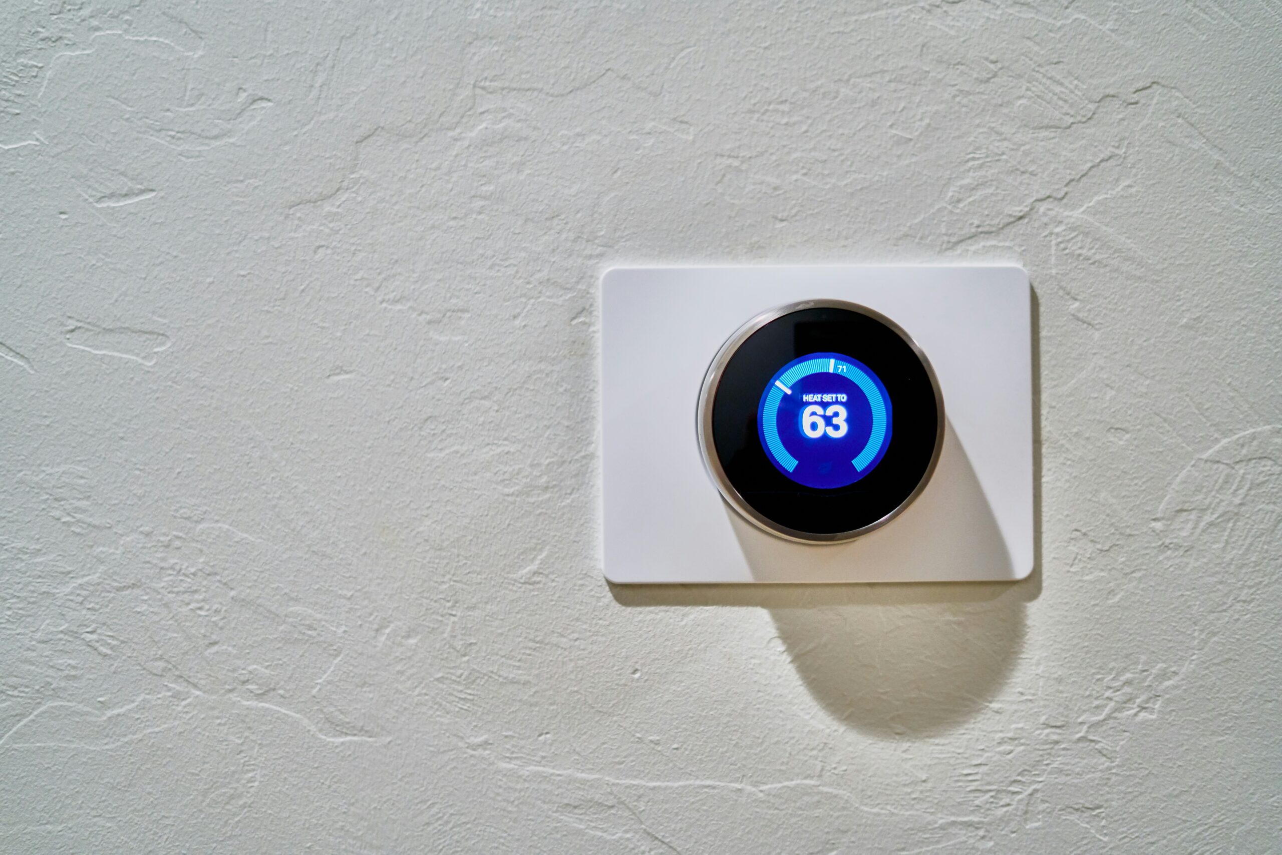 A wall thermostat used to start a home's heating system on a cool day.