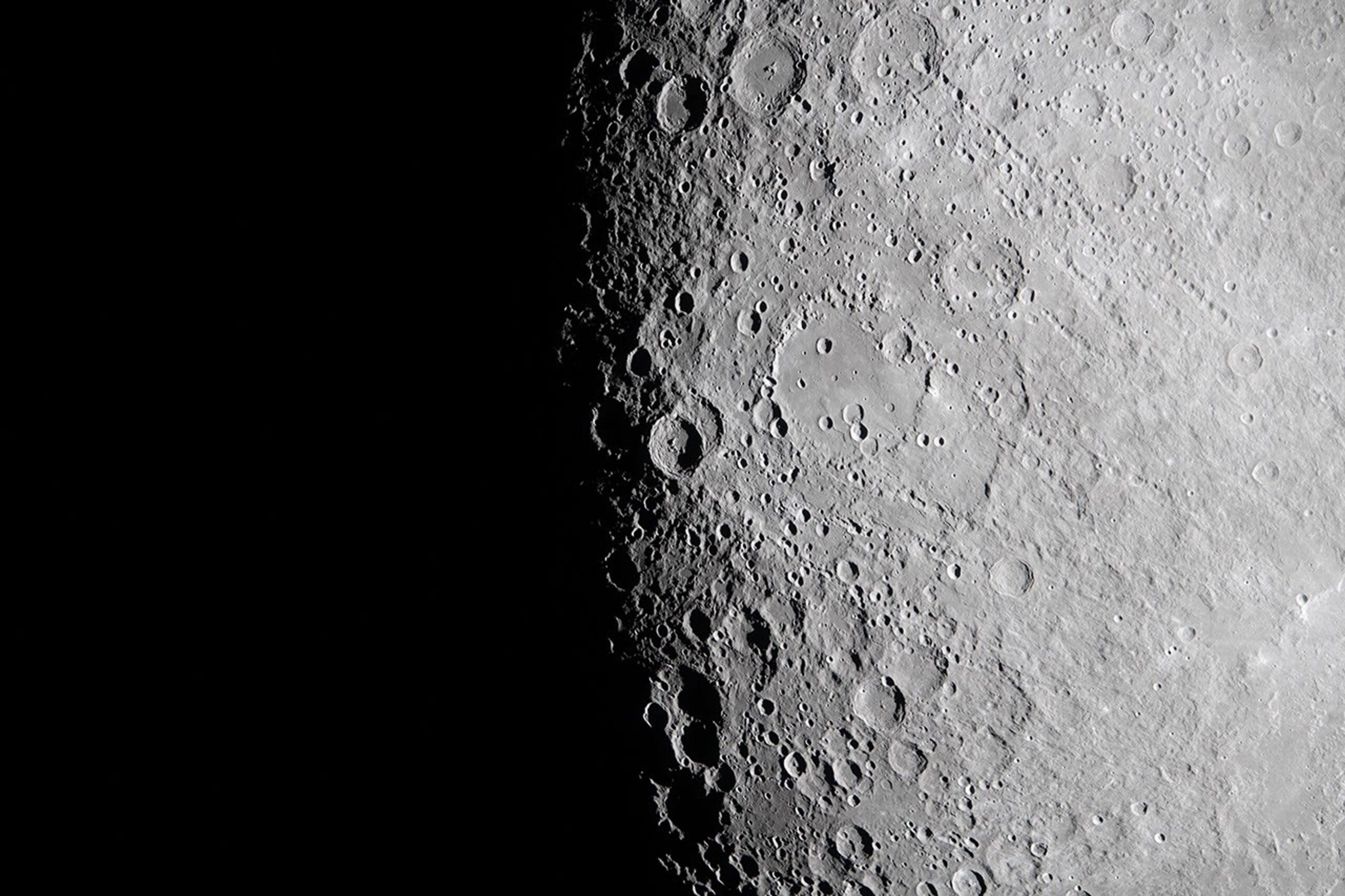 Long shadows reveal cratered terrain along the Moon's day-night boundary