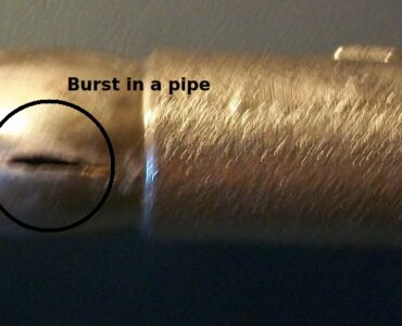 Split exterior plumbing valve damaged when water froze inside the pipe