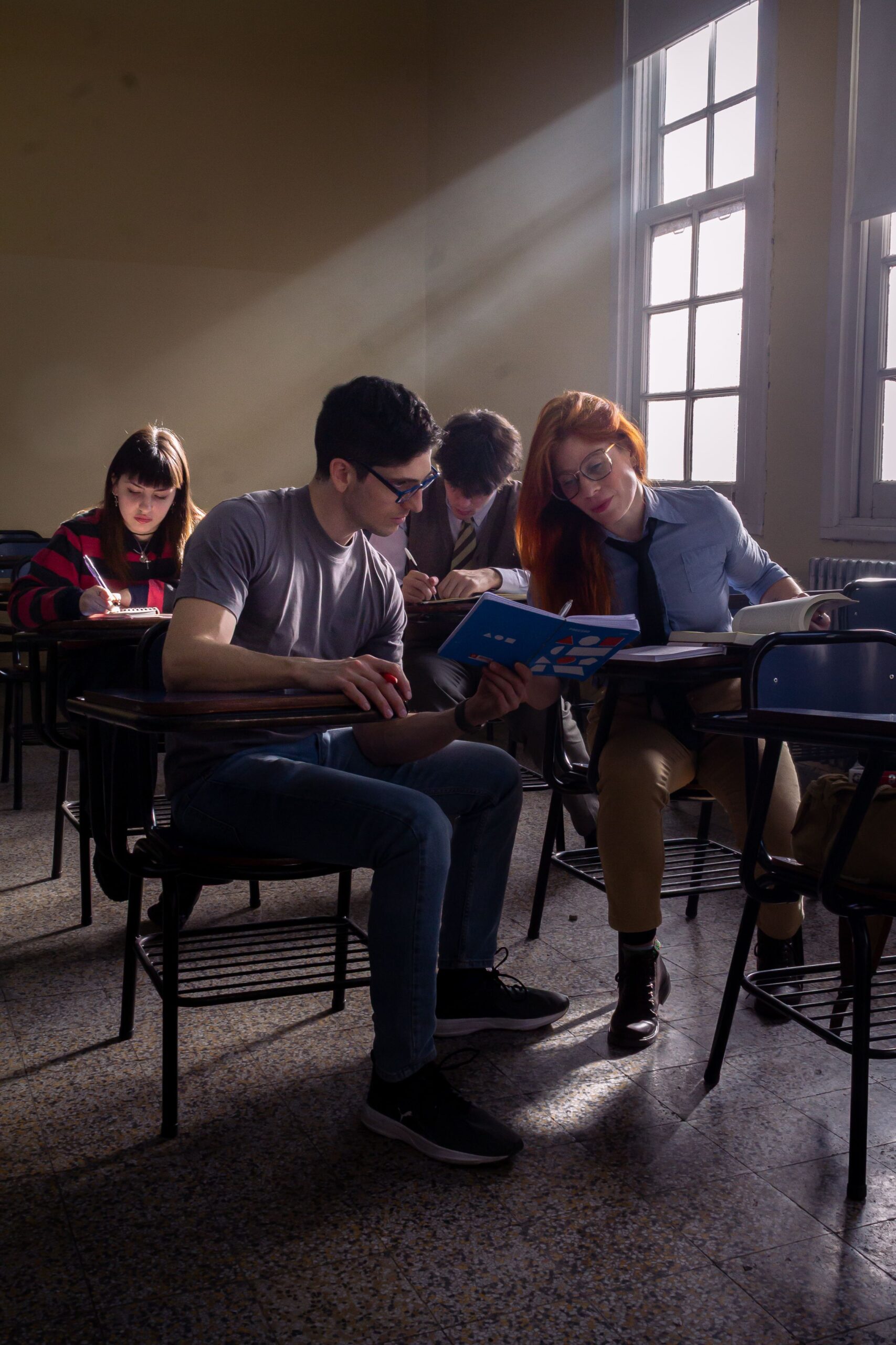 University students working together around a classroom table