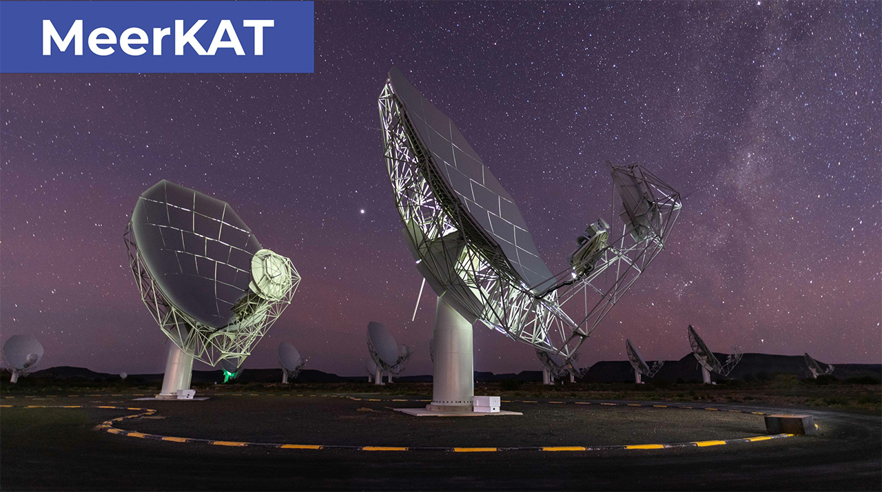 A MeerKAT radio telescope dish beneath a clear sky in South Africa's Karoo