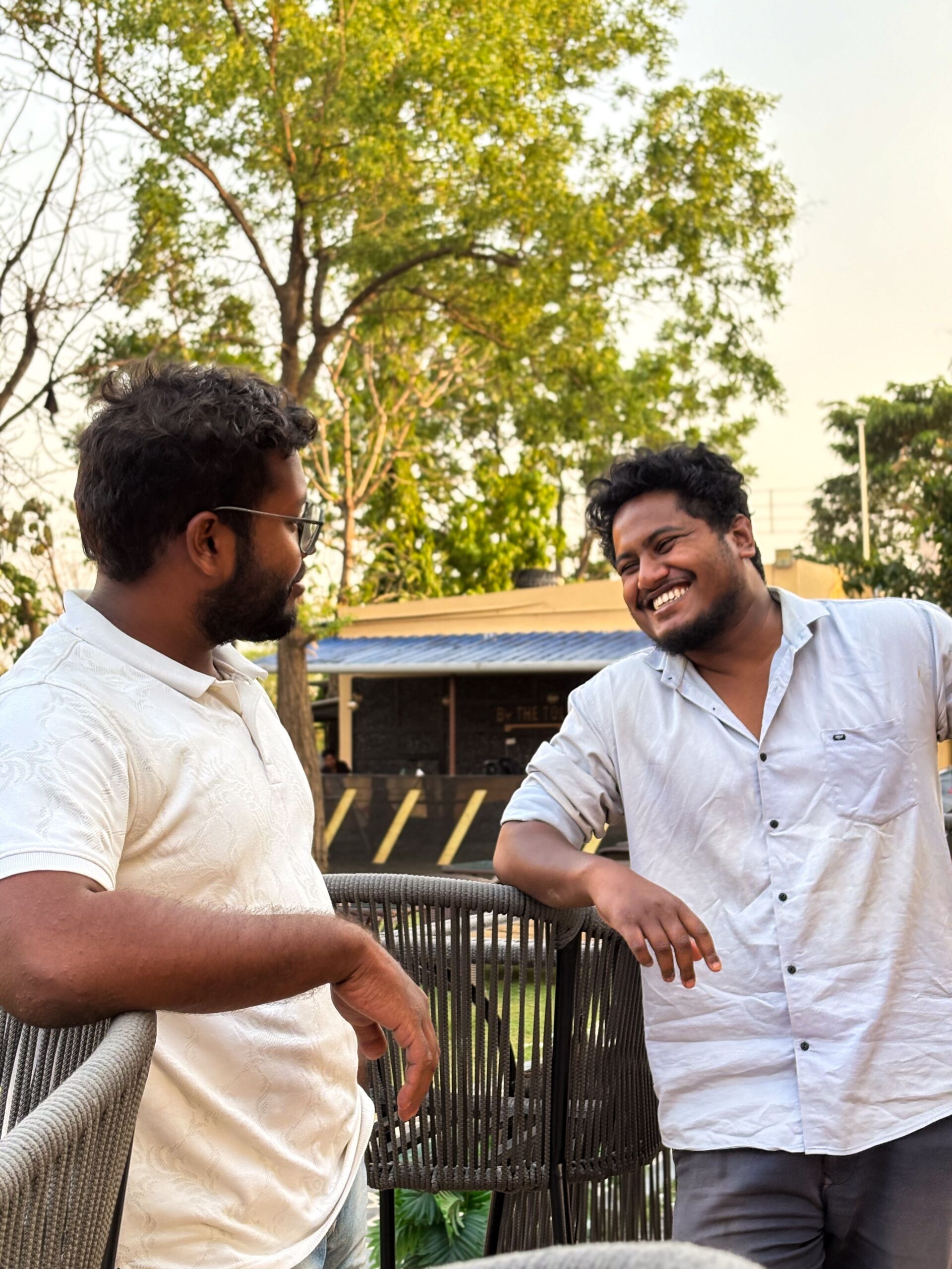 Two friends talking together outdoors