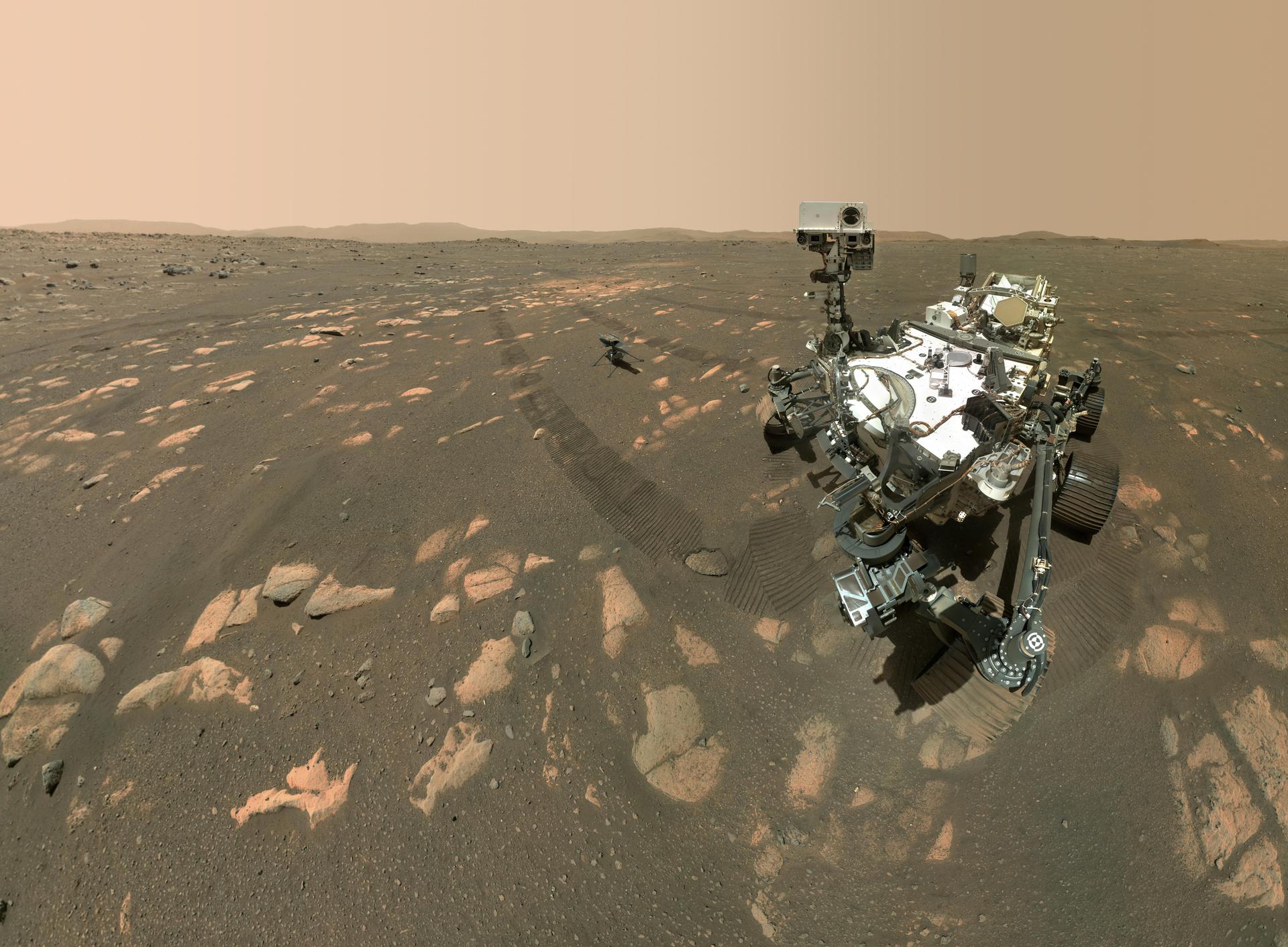 Perseverance rover photographed on Mars with the Ingenuity helicopter nearby
