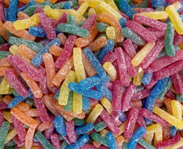 Colorful sugar-coated gummy candies in a bright assortment