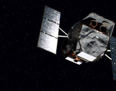 Artist's concept of NASA's Neil Gehrels Swift Observatory orbiting above Earth